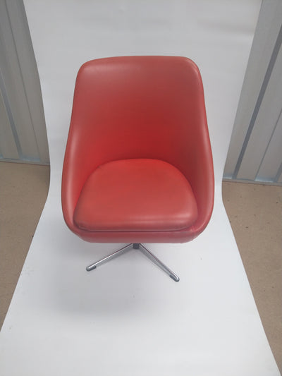 Charming orange swivel chair