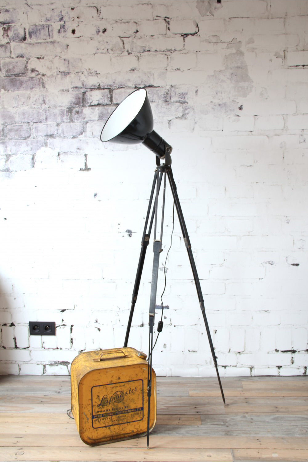 Old industrial lamp on tripod